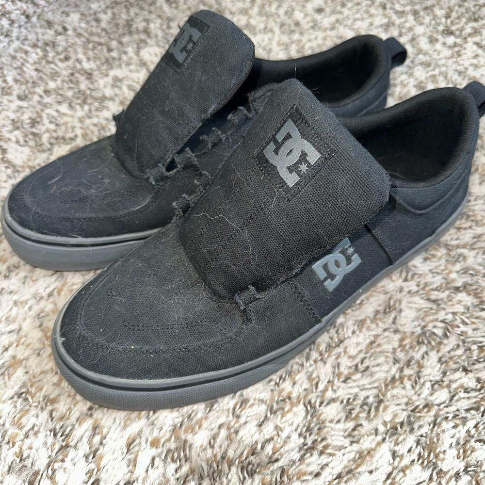 DC Men's Black Canvas Slip-On Sneakers